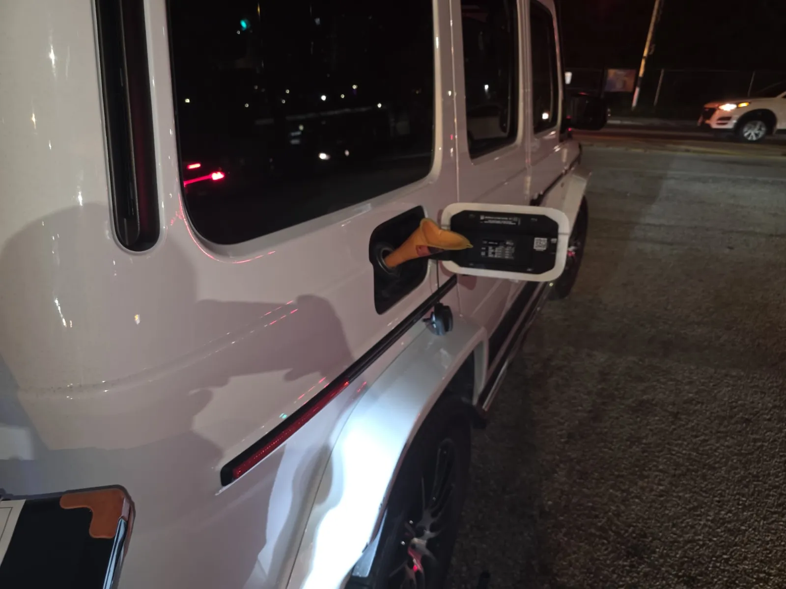 Roadside fuel fill-up on a Mercedes G-Wagon