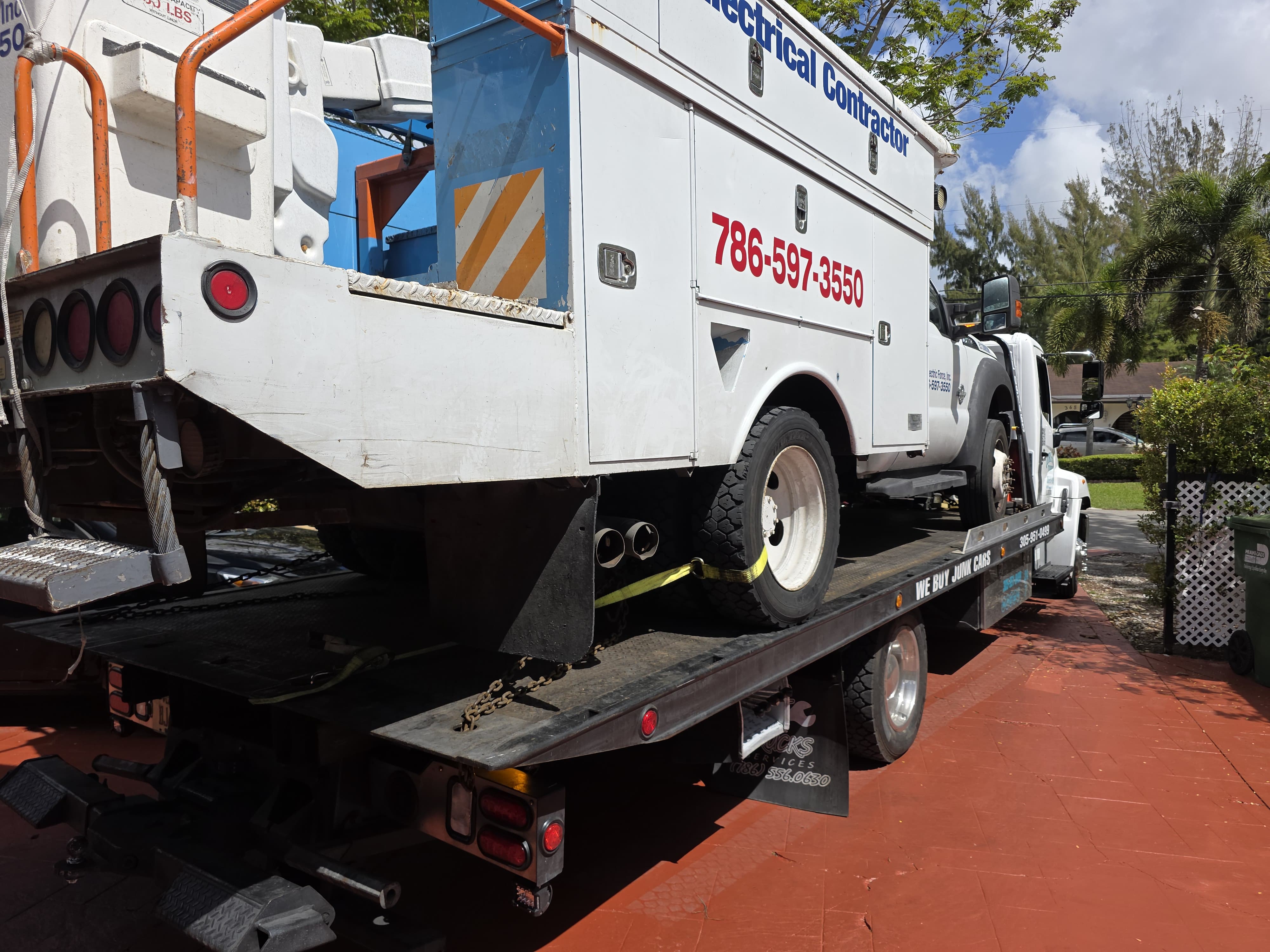 Electrical contractor bucket truck on flatbed