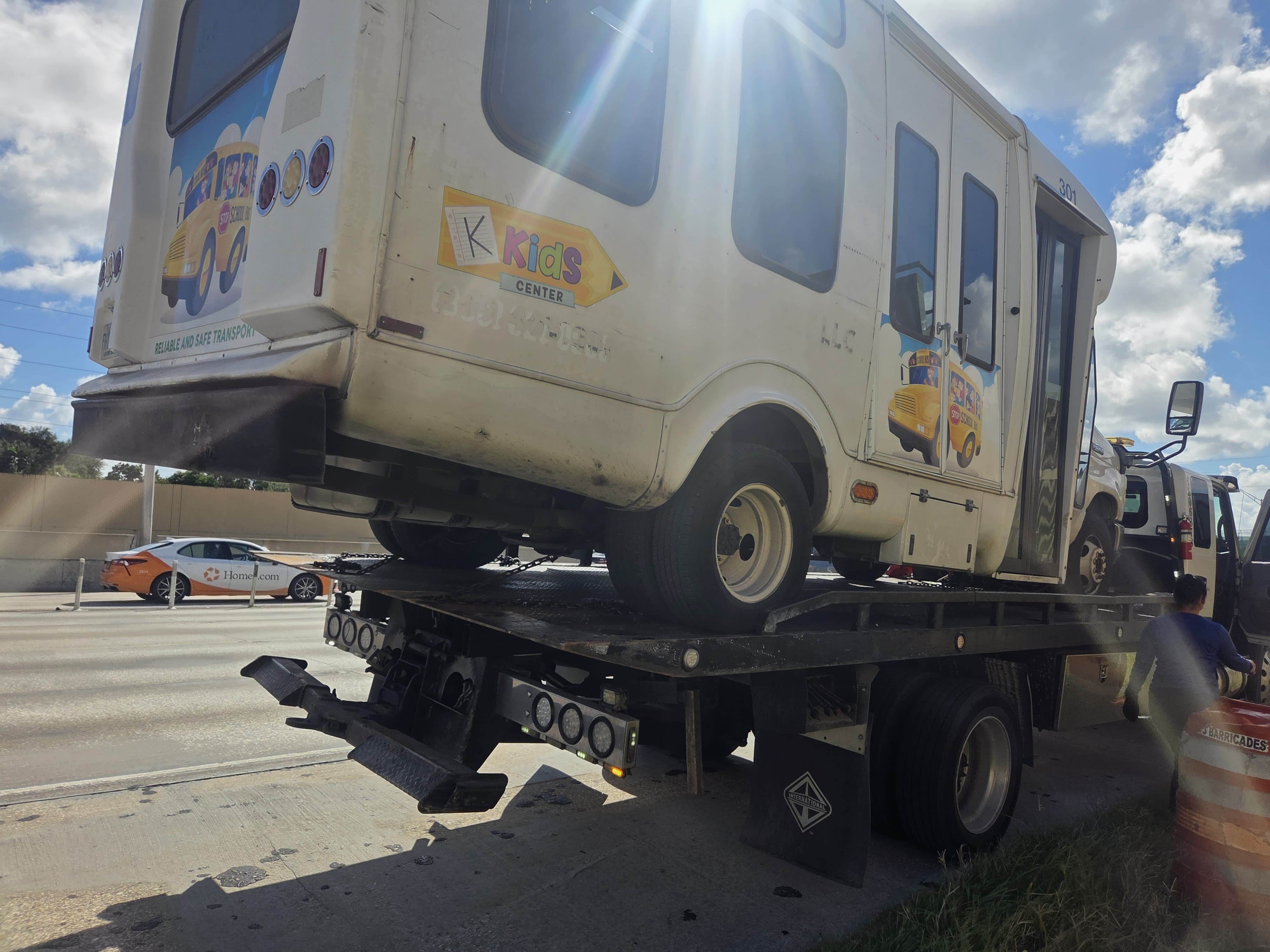 Commercial step van on flatbed