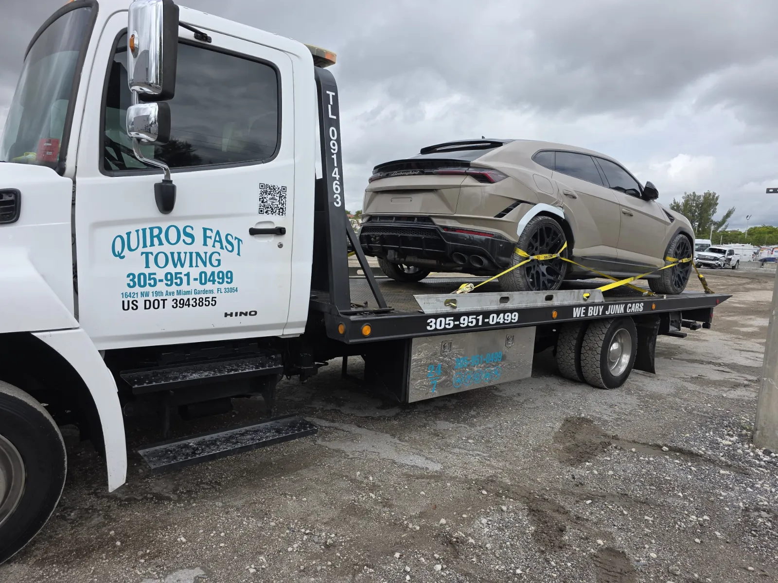 Exotic vehicle secured on a specialty flatbed transport